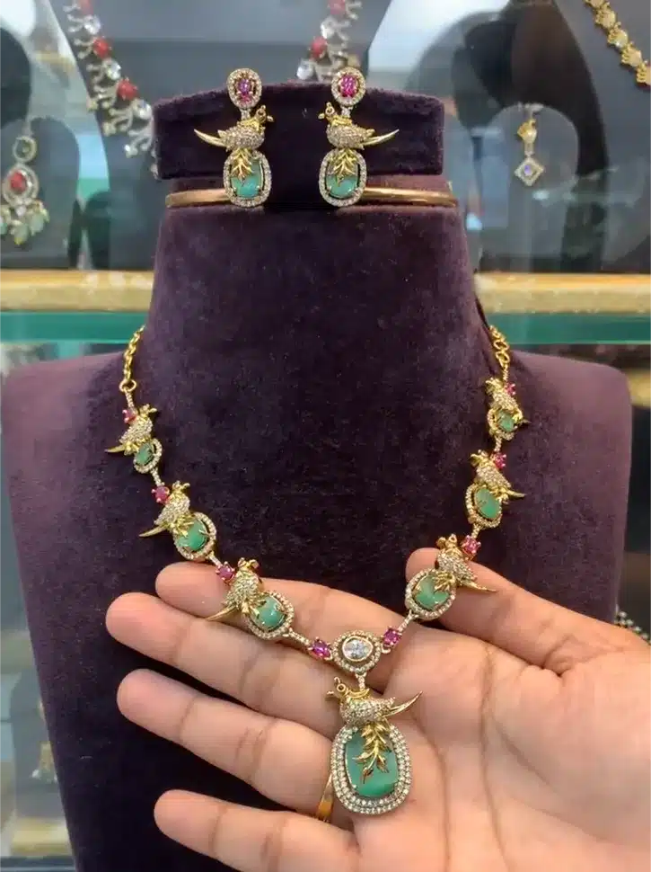 Bird Motif Gold-Plated Stone Necklace Set with
Matching Earrings